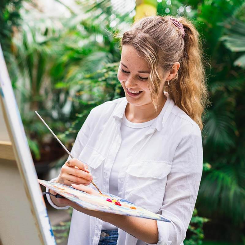 Fotografering av din hobby. Konstnär som fotograferas i Palmhuset Göteborg.